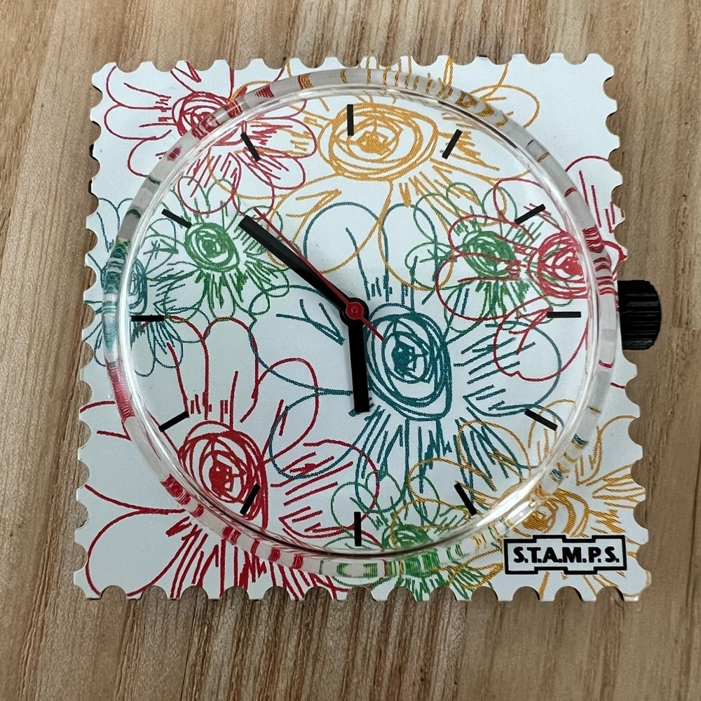 S.T.A.M.P.S. Interchangeable watch face with floral design